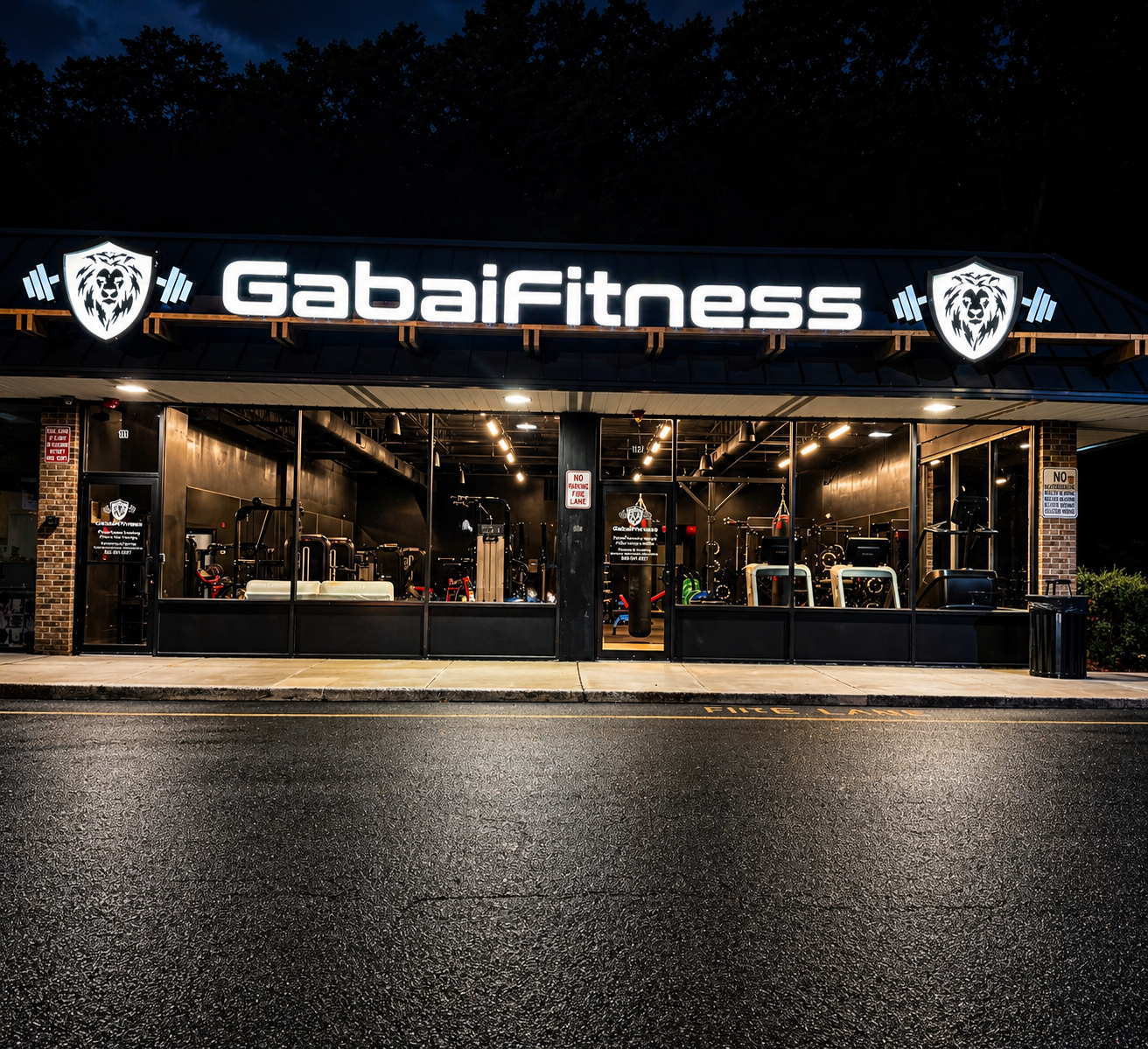 GabaiFitness storefront lit up at night in Pomona, NY